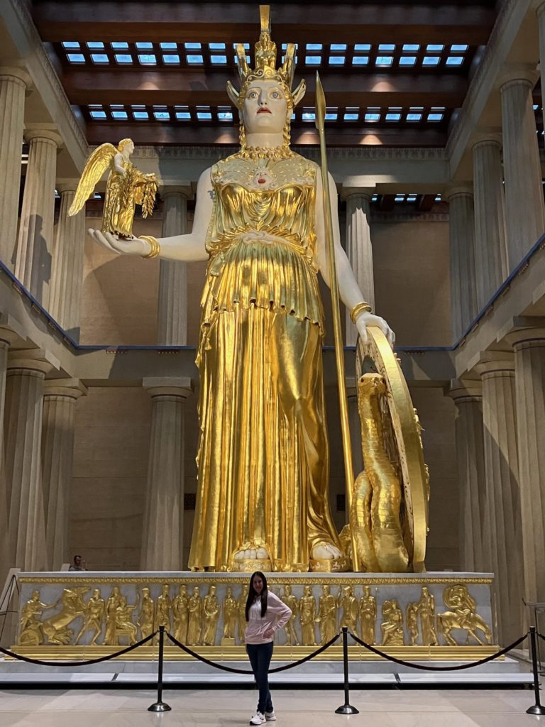 Demi and Athena’s statue at the Parthenon