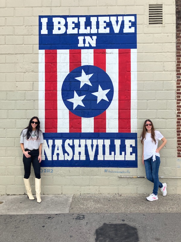 Demi and Chelsea with the I Believe in Nashville mural