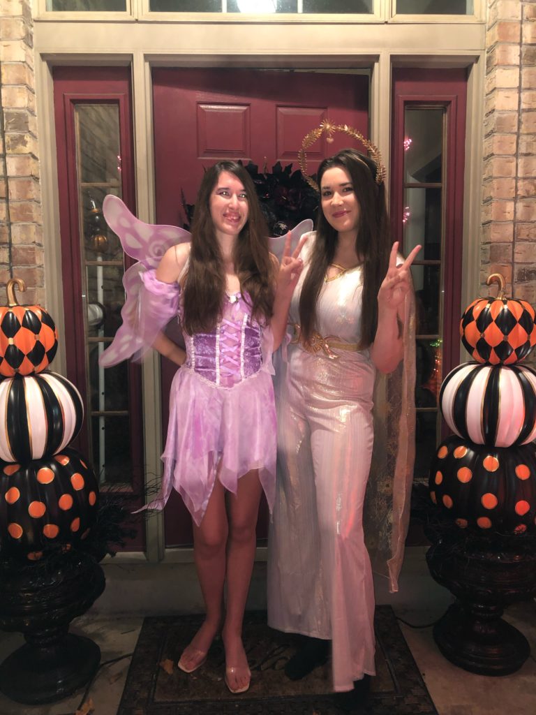 Demi Michelle and her friend Savannah dressed up for Halloween, Demi is a butterfly and Savannah is a sun goddess.