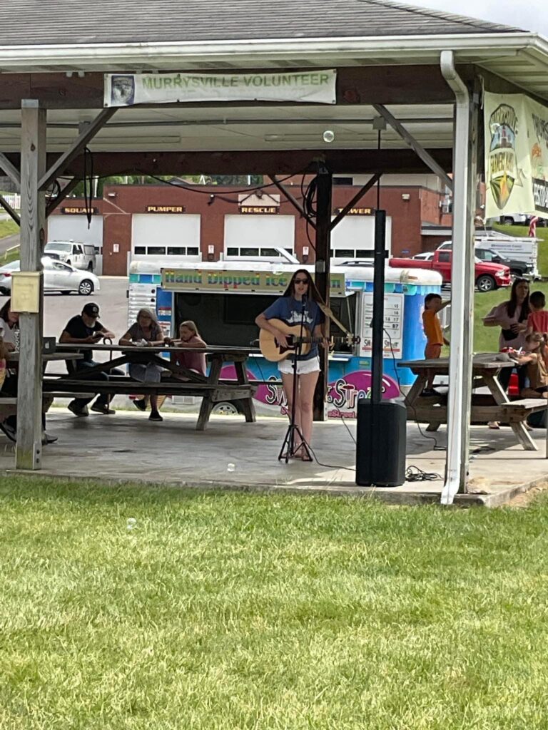 Demi Michelle performing at the Murrysville Farmers Market