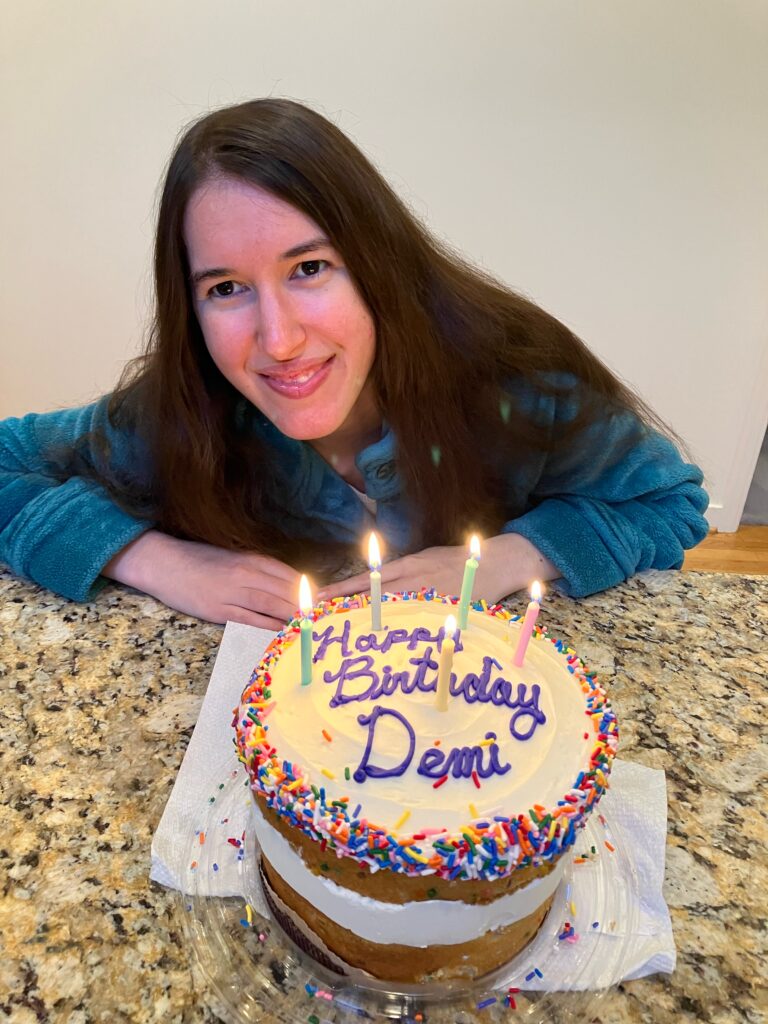 Demi smiling with her birthday cake